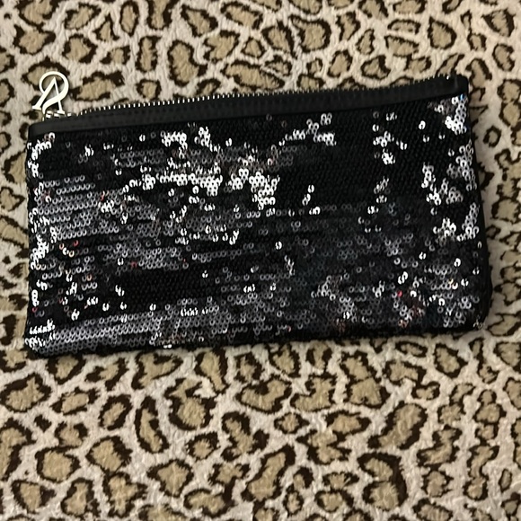 Victoria’s Secret sequin clutch in black, but has a shimmer of silver - Picture 6 of 8